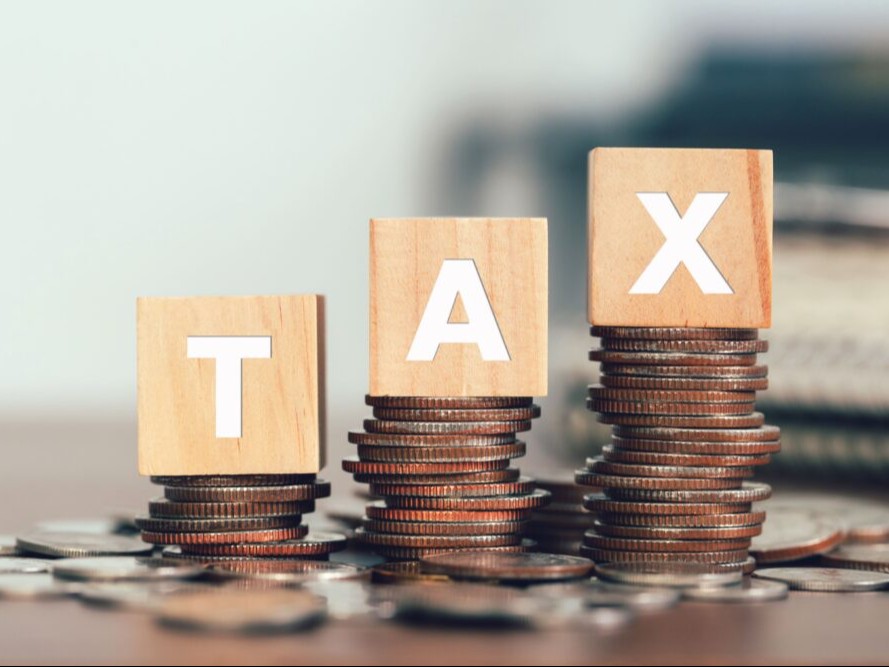 tax-concept-with-wooden-cubes-with-word-tax-stacke_1784547169.jpg